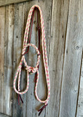 Harnais de hackamore Loping et rênes fendues à 12 brins de la marque Slippery Moon Mecates, avec boucles et corde en cuir.