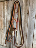 Accessoires équestres : hackamore Loping et rênes mecate ombré 12 brins de la marque Slippery Moon Mecates.