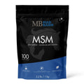 Complément MSM 1kg de Madbarn, soin naturel pour animaux, en poudre dans un sac avec logo Madbarn visible.