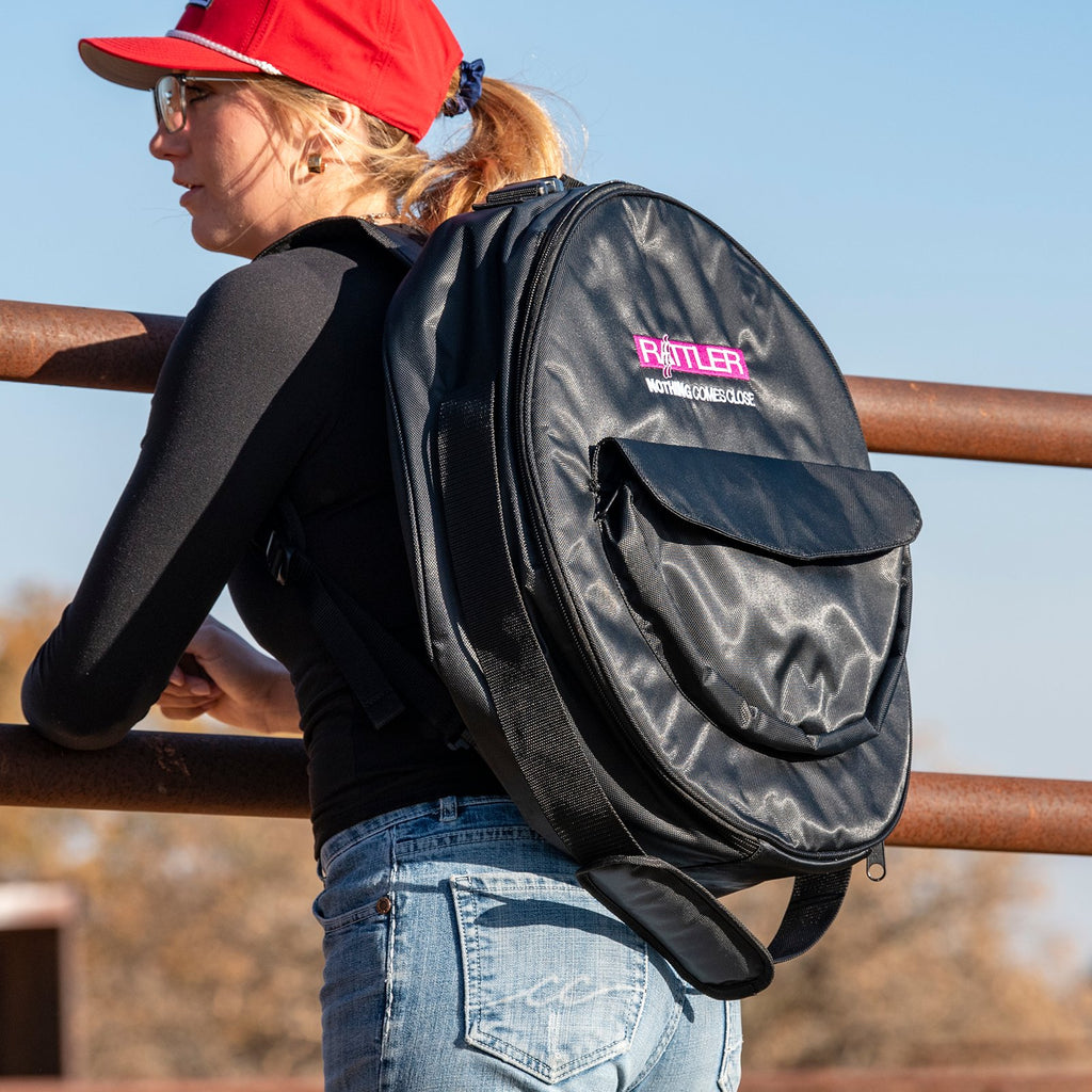 Sac à ropes breakaway Equibrand de couleur noire, conçu pour l'équitation, avec fermeture de sécurité et fixation robuste.