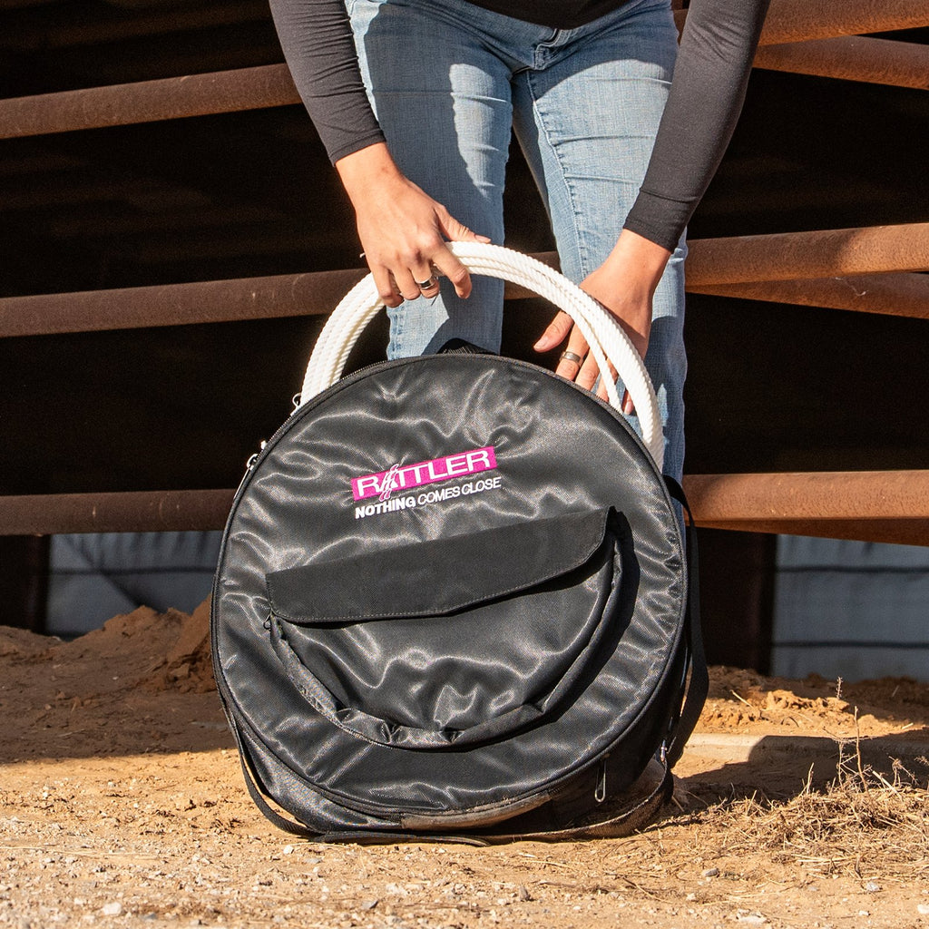 Sac à ropes breakaway Equibrand, en tissu noir avec boucles en métal, conçu pour la sécurité et la facilité d'utilisation.